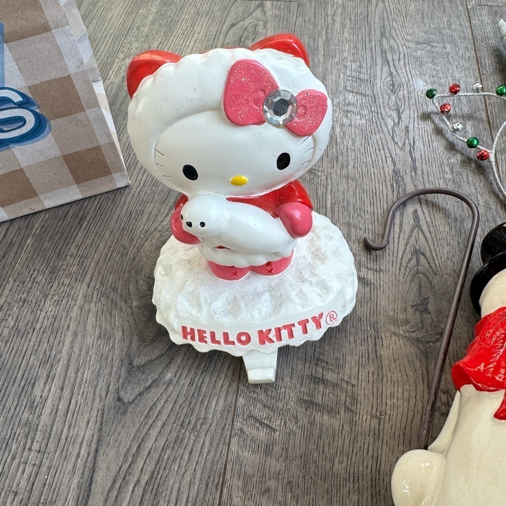 Sanrio Hello Kitty Holding Baby Seal Christmas Stocking Holder Collectible